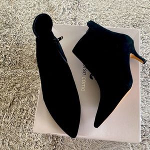 The black boot worn only once or twice. The gray boots have never been worn.